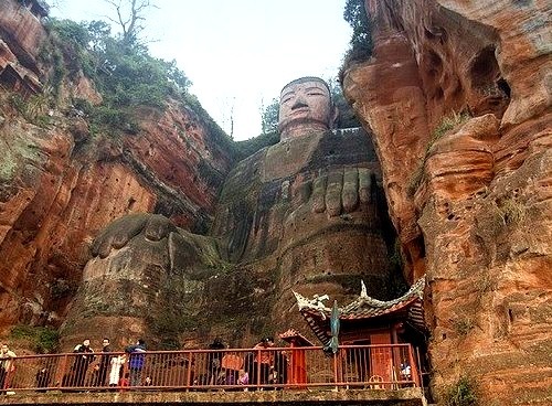 by p!ng on Flickr.Leshan Giant Buddha It is carved out of a cliff face that lies at the confluence of the Minjiang, Dadu and Qingyi rivers in the southern part of Sichuan province in China. It is the...